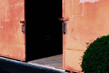 The red steel warehouse door