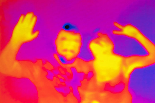 Man and woman in infrared light.
