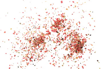 Colorful ground mixed pepper grains, flakes isolated on white background, top view
