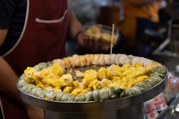 Hot dumplings in battered steamed on the gas stove
