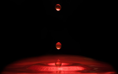glowing red dropping liquid