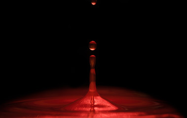 glowing red dropping liquid