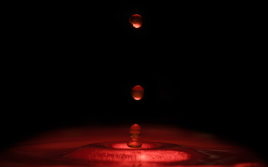 glowing red dropping liquid