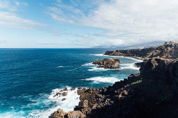 A powerful storm in the Atlantic Ocean in a bay on the coast of Tenerife.