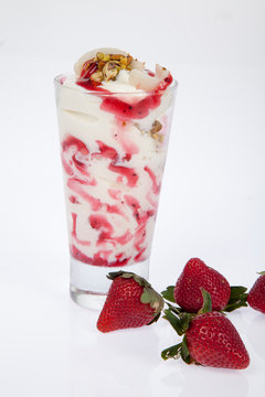 Tasty strawberry smoothie; Photo on white background.