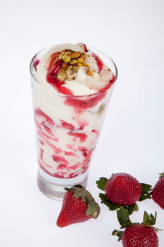 Tasty strawberry smoothie; Photo on white background.