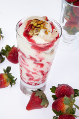 Tasty strawberry smoothie; Photo on white background.