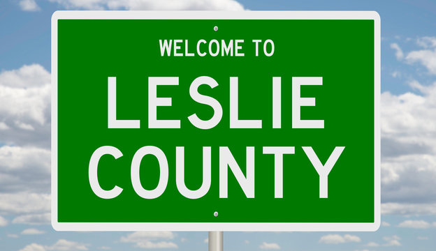 Rendering of a green 3d highway sign for Leslie County
