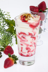 Tasty strawberry smoothie; Photo on white background.