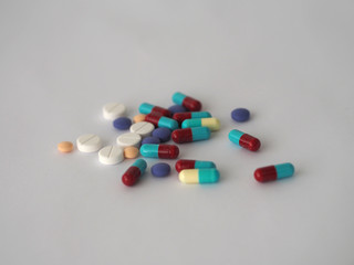 Tablets pills capsule heap mix therapy drugs, colorful