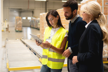 Managers checking the list of products	