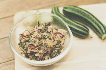 Thai southern spicy Budu salad and herb at market