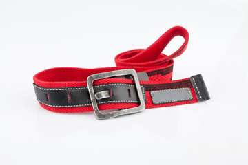Fashion, fabric belt with metal buckle; photo on white background