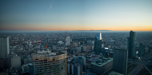 Panoramic view of Milan (Italy) at sunset. Buildings under construction in the Porta Garibaldi area.