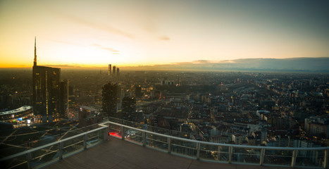 Milan cityscape at sunset, panoramic view with new skyscrapers in Porta Nuova district. Italian landscape.