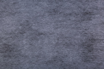 The texture of the veil of dark grey color as the blurred background
