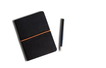 Notepad and pen on the white background