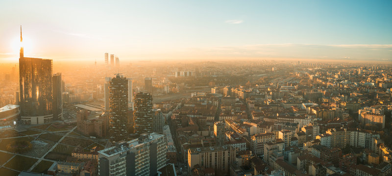 Milan cityscape at sunset, panoramic view with new skyscrapers in Porta Nuova district. Italian landscape.