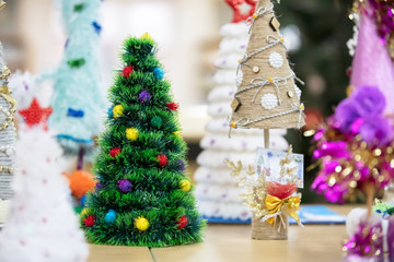 Many christmas trees handmade.