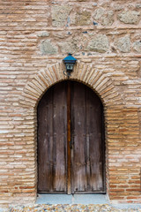 Wooden Door on brick wall