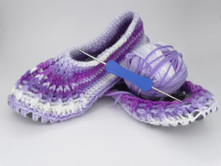 Knitted Slippers made of gradient wool yarn.