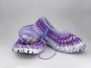 Knitted Slippers made of gradient wool yarn.