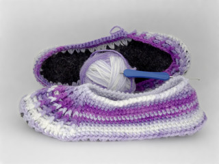 Knitted Slippers made of gradient wool yarn.