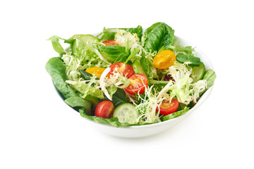 Fresh vegan salad with cherry tomatoes isolated on white background. Side view with copy space.