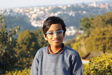 A cute Indian boy smiling