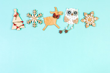 Top view Christmas toys and decorations on colorful background. New Year holiday concept with copy space
