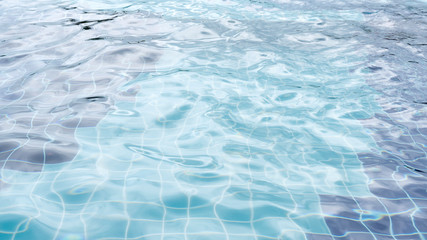 Light reflection water surface on swimming pool..