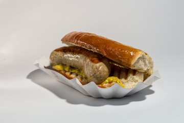 fast food german food on a white clean background. European bread and cake. strangers and princesses with yellow cheese and minced meat.