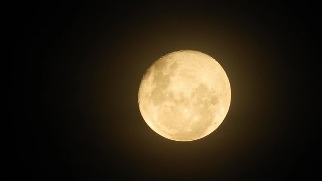 Haunted full moon turning to blood moon with eerie dark night, perfect for halloween or scary video transitions.