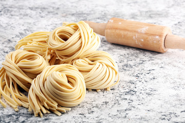 Closeup of raw homemade pasta. fresh italian traditional raw fresh pasta