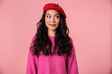 Image of positive beautiful asian girl with long dark hair wearing beret