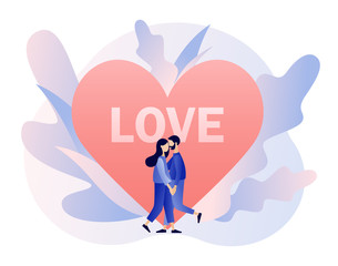 Loving couple hugging. Tiny people with big heart. Romantic date concept. Characters Valentine day. Modern flat cartoon style. Vector illustration on white background