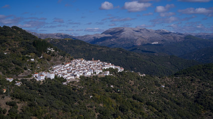 Fototapeta na wymiar Aerial view of houses in a town, El Mirador Del Genal, Malaga Province, Spain