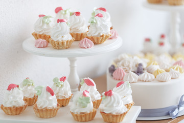 Sweet cakes with cream. The concept of children's holidays