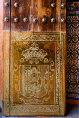 Details of coat of arms relief on walls of church, Church of San Bartolome, Seville, Seville Province, Spain