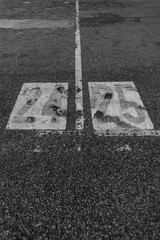 numbers painted on the asphalt road