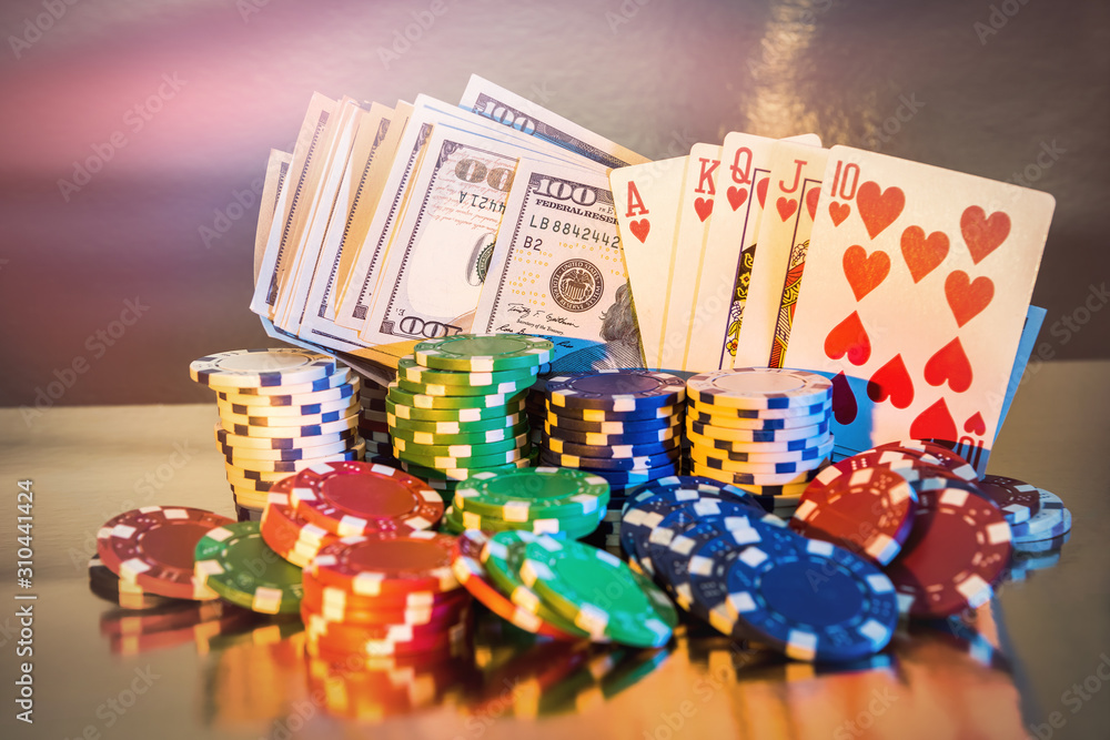 Wall mural poker concept - chips, playing card and us money on golden background