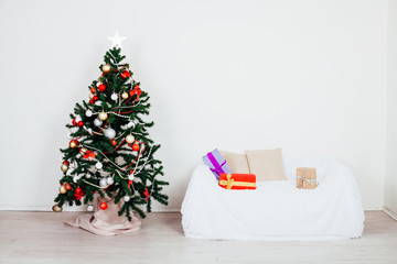 Christmas tree gifts new year white room with sofa