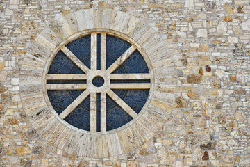Large window wheel close-up at the church the heart of Jesus in the European city of Pforzheim in Germany