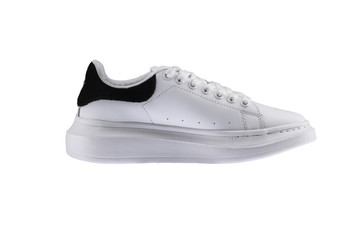 Sport shoes. White sneaker with a black insert on a white background.