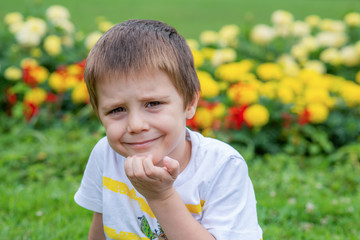 Boy sitting on the grass