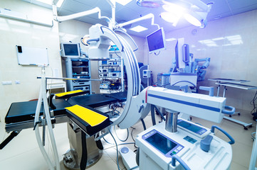 Modern equipment in operating room. Medical devices for neurosurgery. Background. Interior with x-ray screen and equipment.