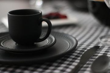 cup of coffee on wooden table