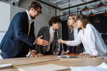 Business people having discussion, dispute or disagreement at meeting or negotiations