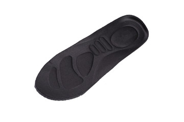 Black orthopedic insole on a white background