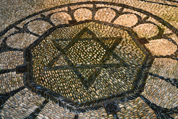 The Star of David mozaic on flooring in Cordoba Synagogue, District Centro, C�rdoba, C�rdoba Province, Spain - 310445856